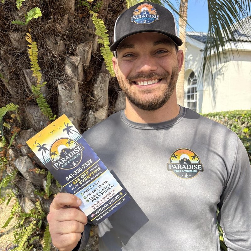 Nick Dupras in branded Paradise Pest & Wildlife shirt